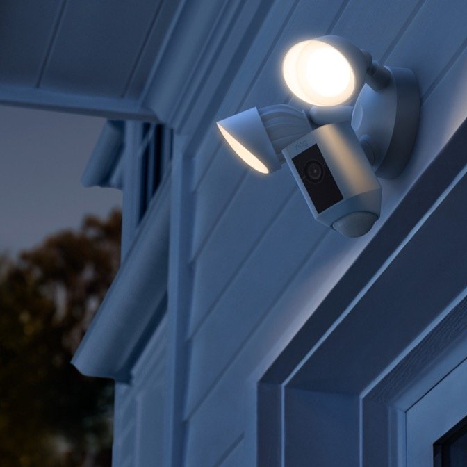 Floodlight security camera mounted on the exterior of a Tampa home
